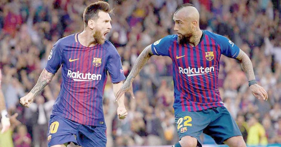 Lionel Messi y Arturo Vidal