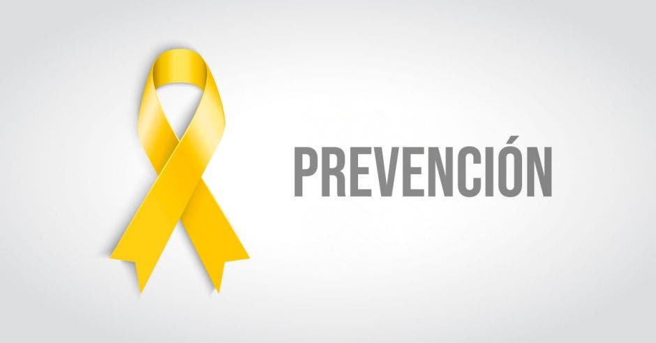 Un lazo amarillo y la palabra prevención