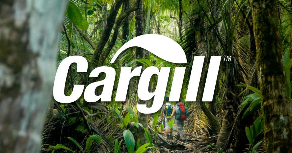 Logo del Cargill, fondo de árboles