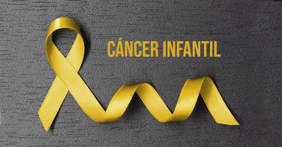 Un lazo amarillo con la palabra cáncer infantil