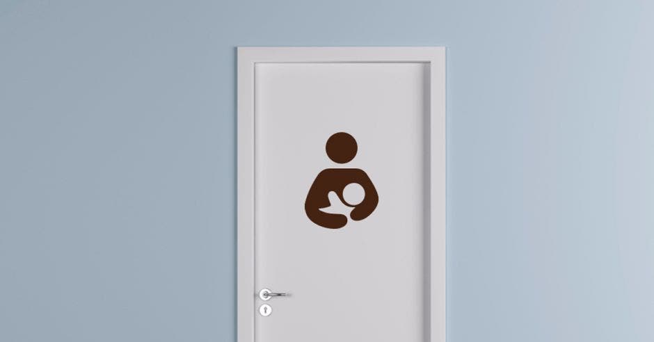 Una puerta con un símbolo de una madre dando lactancia