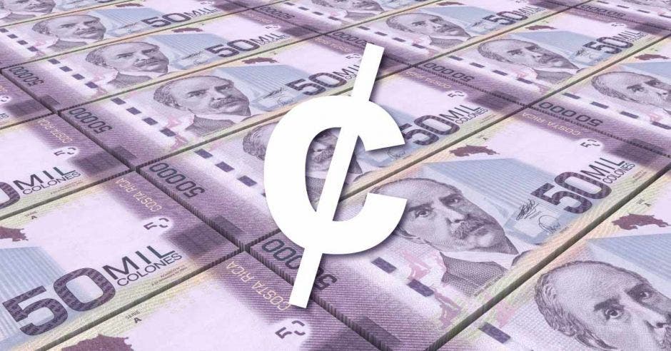 Signo de colón sobre una serie de billetes de ¢50 mil