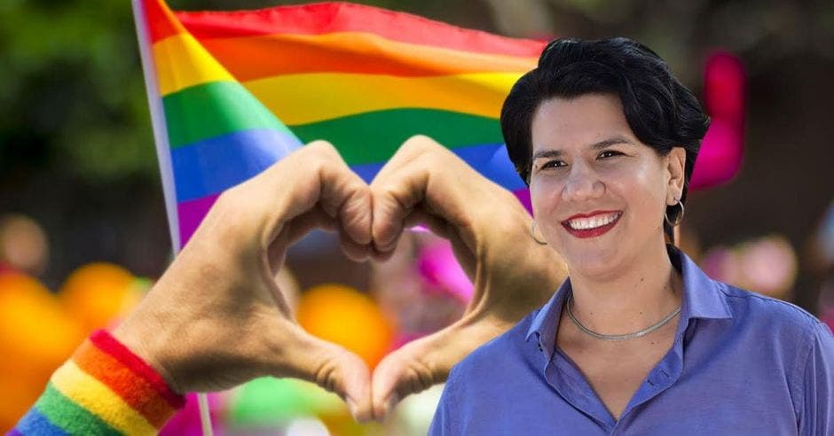 Margarita Salas, nueva comisionada nacional LGBT+, con banderas de fondo