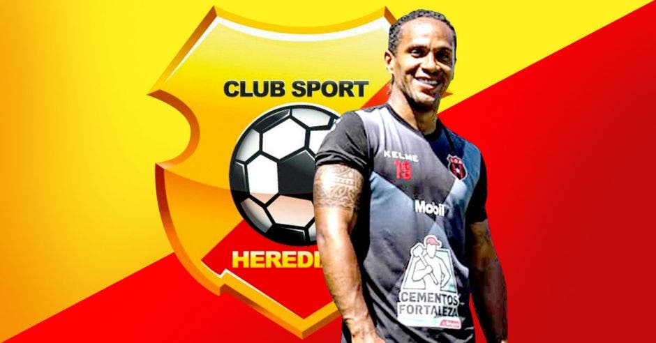 Jonathan McDonald frente a escudo de Herediano