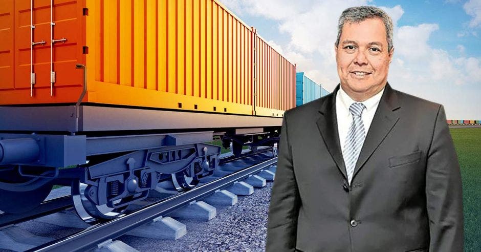 Arte de Dante Mossi, presidente ejecutivo del BCIE con un sistema de tren de carga de fondo