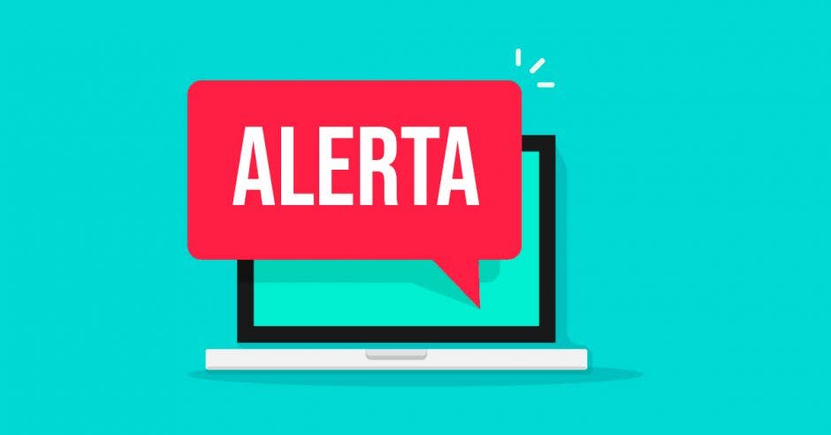 Computadora con señal de alerta