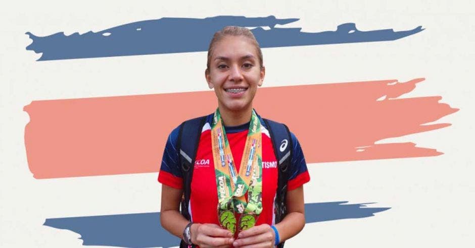 Noelia vargas con medalla y fondo de bandera