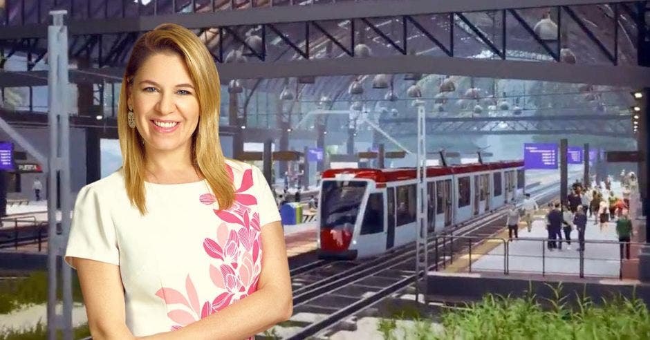 La primera dama Claudia Dobles, con un fondo de como sería la estación del tren eléctrico